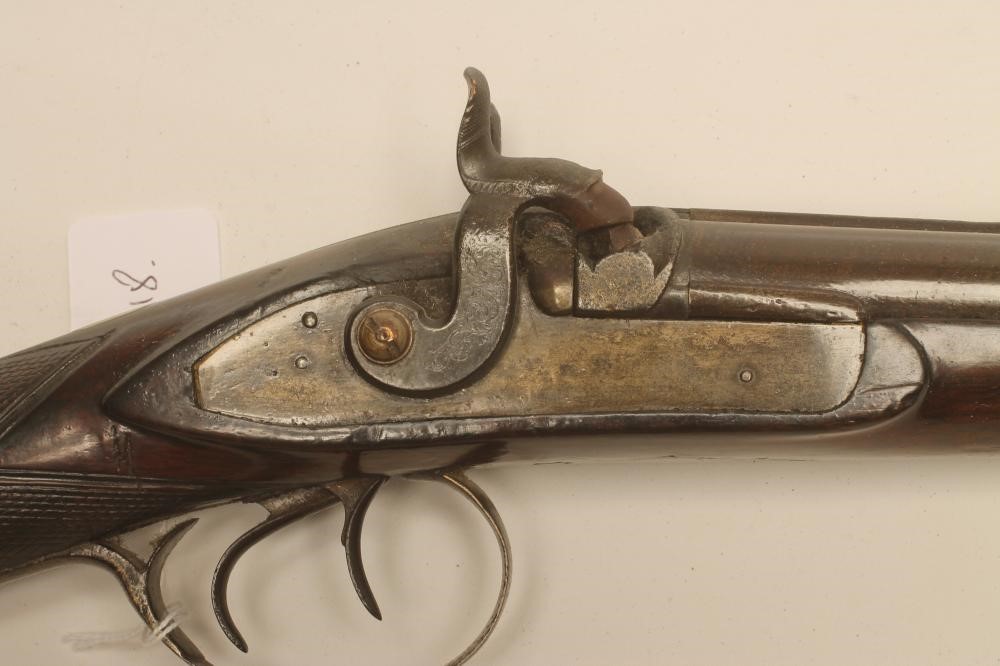 A DOUBLE BARRELLED PERCUSSION SHOTGUN Image