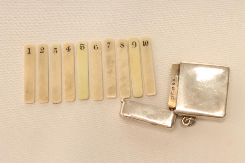 A SILVER "VESTA CASE" PEG FINDER Image