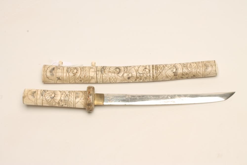 A JAPANESE CARVED BONE TANTO Image