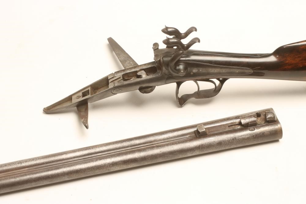 A FRENCH PINFIRE DOUBLE BARRELLED SHOTGUN Image