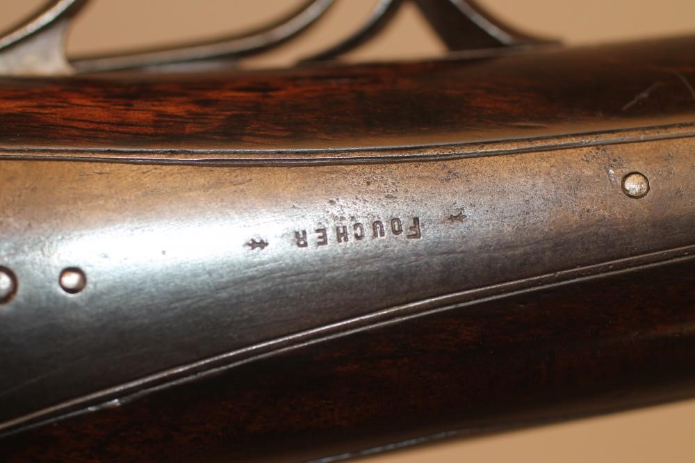 A FRENCH PINFIRE DOUBLE BARRELLED SHOTGUN Image