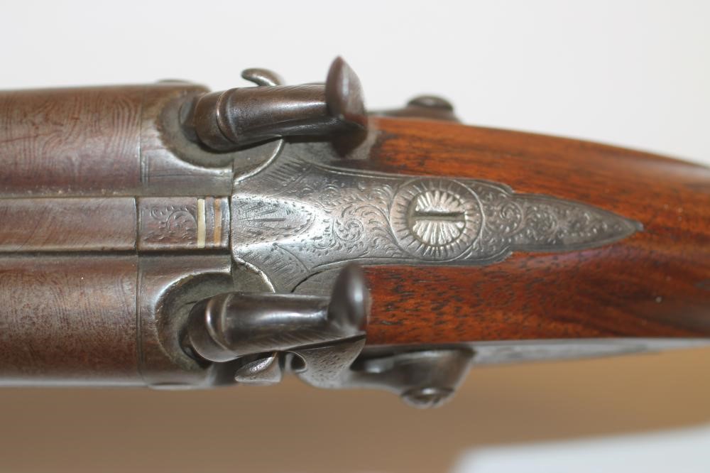 A PERCUSSION DOUBLE BARRELLED SPORTING SHOTGUN Image