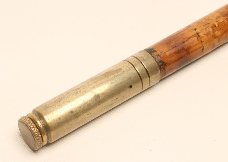 A POACHER'S WALKING stick Image