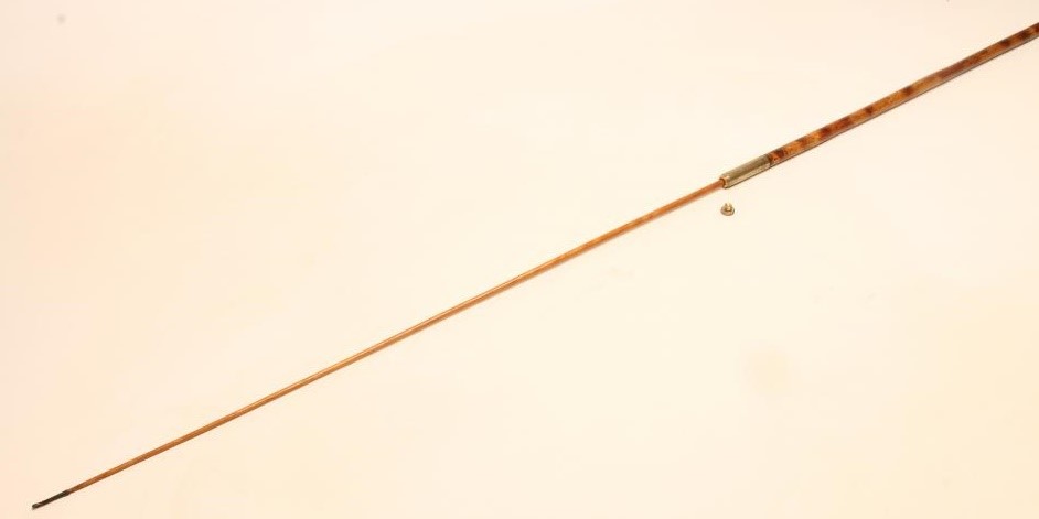 A POACHER'S WALKING stick Image