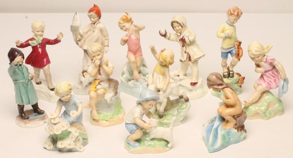 A SET OF TWELVE ROYAL WORCESTER CHINA FIGURES Image
