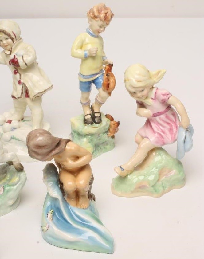 A SET OF TWELVE ROYAL WORCESTER CHINA FIGURES Image