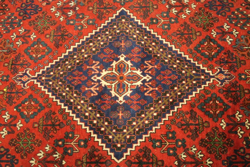 A MODERN PERSIAN RUG Image