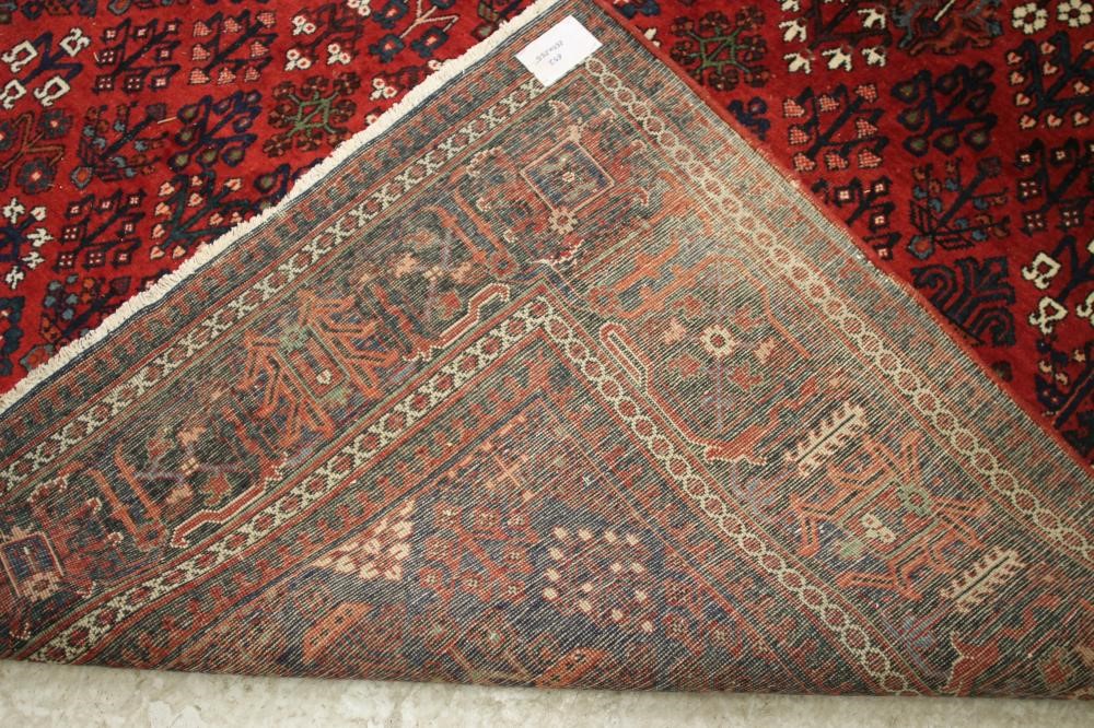 A MODERN PERSIAN RUG Image