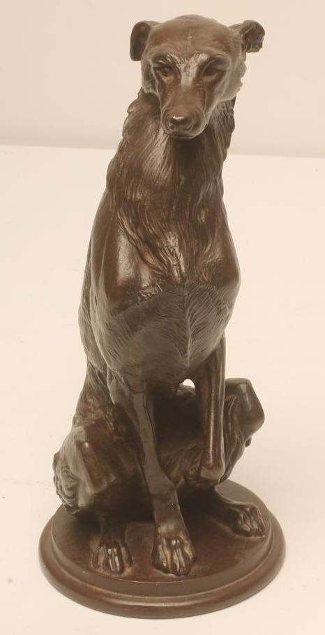 A COALBROOKDALE STYLE CAST IRON FIGURE OF A DEER HOUND in a bronzed finish Image