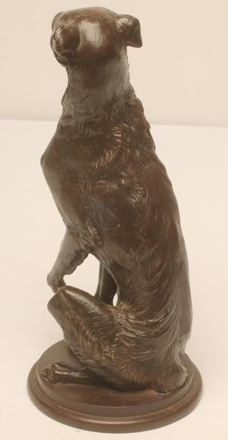 A COALBROOKDALE STYLE CAST IRON FIGURE OF A DEER HOUND in a bronzed finish Image