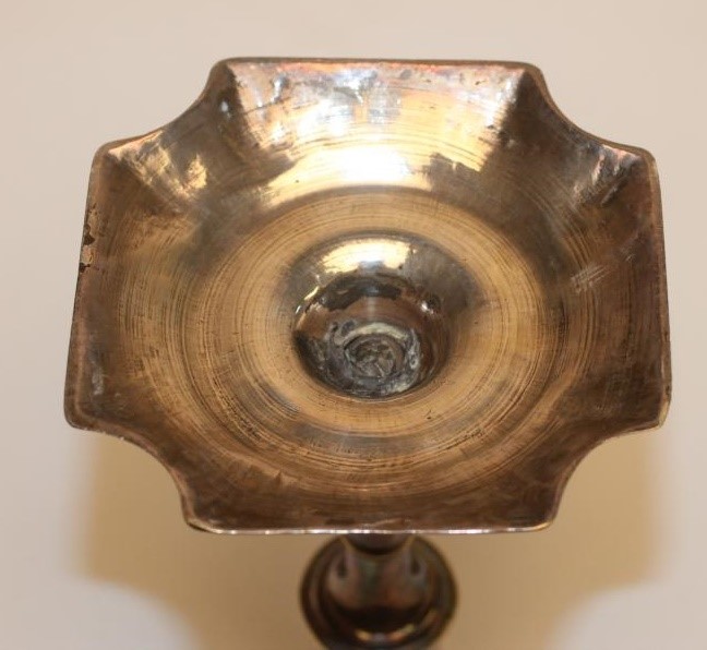 A PAIR OF GEORGIAN SILVERED BRASS CANDLESTICKS Image