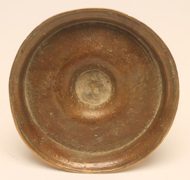 A BRASS CANDLESTICK Image