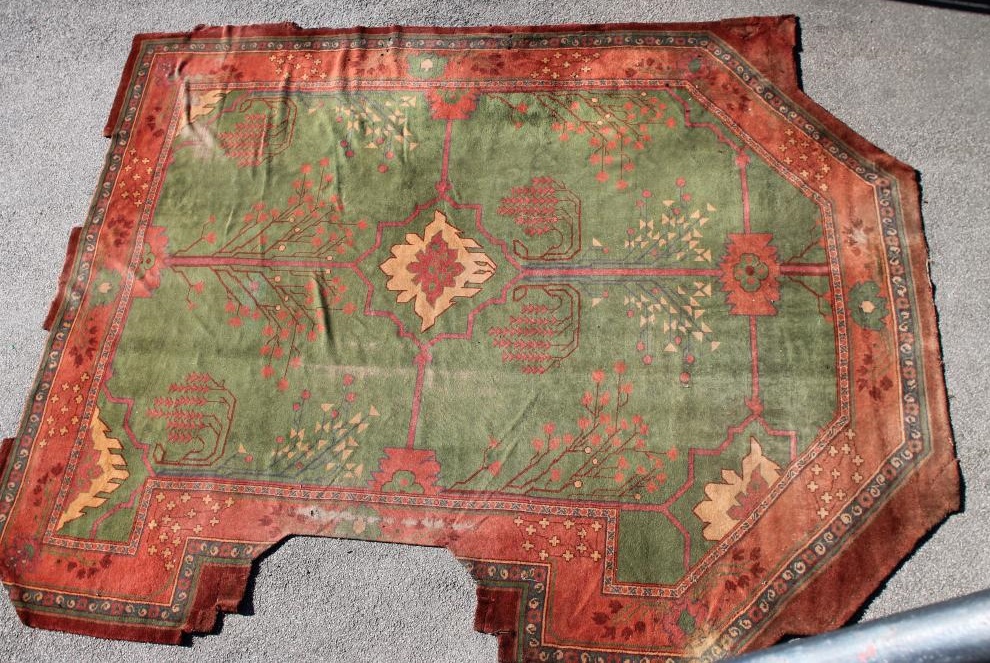 A DONEGAL STYLE ARTS & CRAFTS WOOL CARPET Image