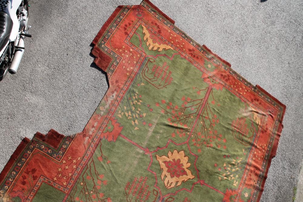 A DONEGAL STYLE ARTS & CRAFTS WOOL CARPET Image