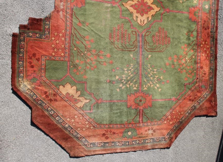 A DONEGAL STYLE ARTS & CRAFTS WOOL CARPET Image