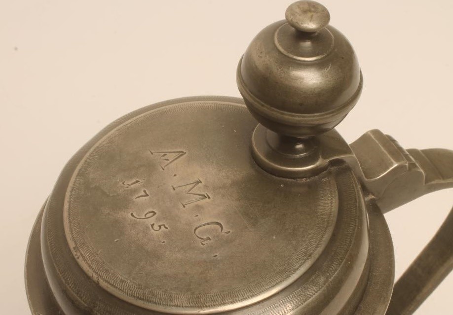 A GERMAN PEWTER BEER TANKARD Image