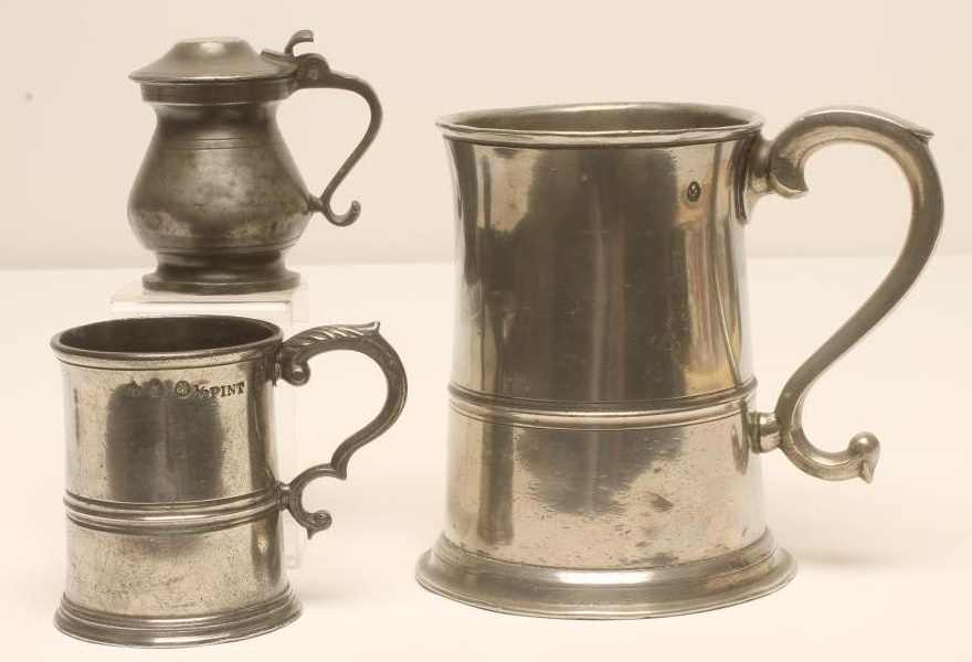 A PEWTER QUART TAVERN MUG by the Edinburgh maker James Mayes together with a pewter half pint Image