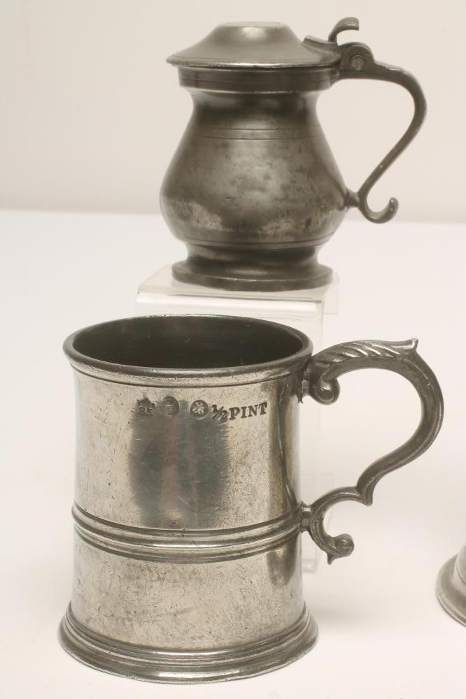 A PEWTER QUART TAVERN MUG by the Edinburgh maker James Mayes together with a pewter half pint Image