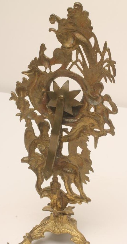 A GEORGIAN ROCOCO BRASS WATCH STAND Image