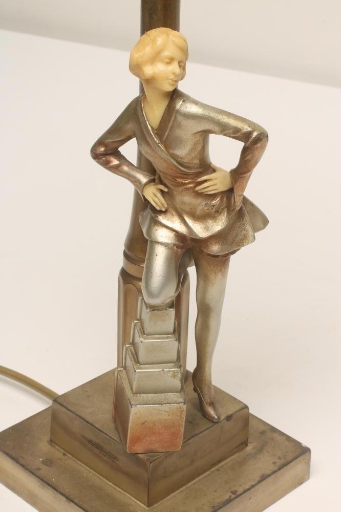 AN ART DECO SILVERED SPELTER FIGURAL TABLE LAMP BASE Image