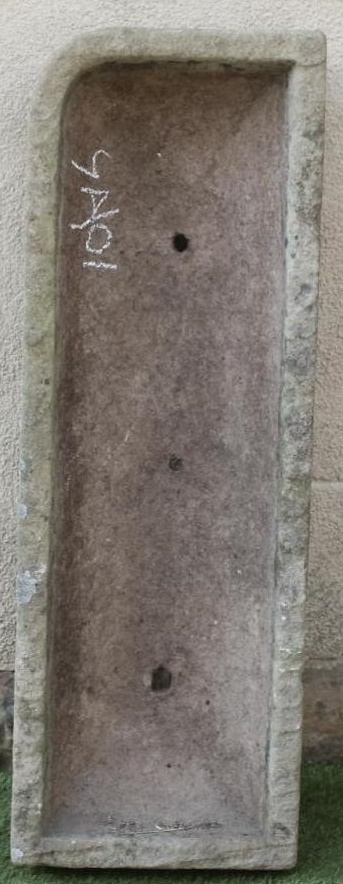 A SANDSTONE TROUGH of narrow rounded oblong form Image