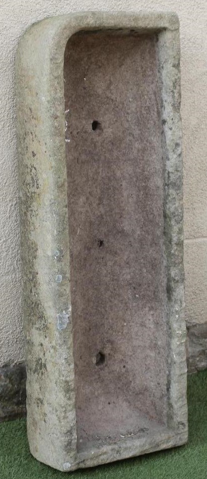 A SANDSTONE TROUGH of narrow rounded oblong form Image