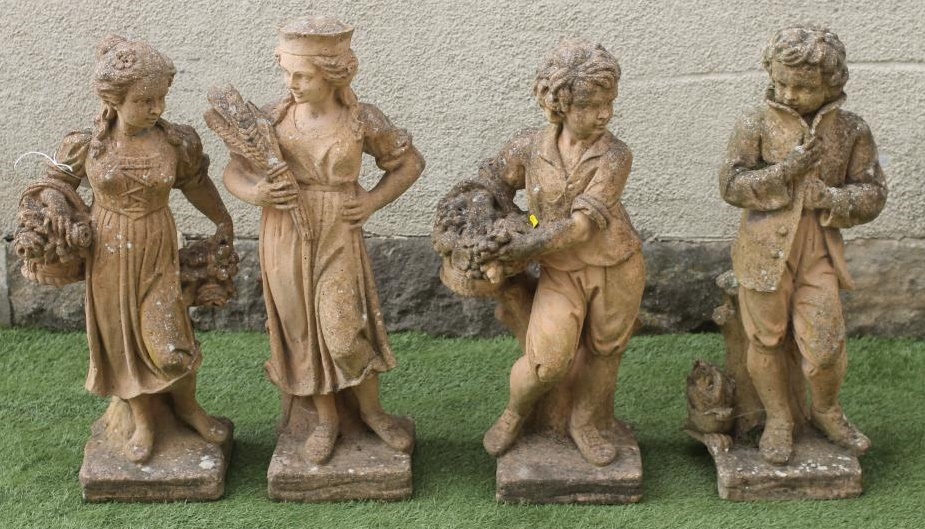 A SET OF FOUR COMPOSITION RED SANDSTONE FIGURES Image
