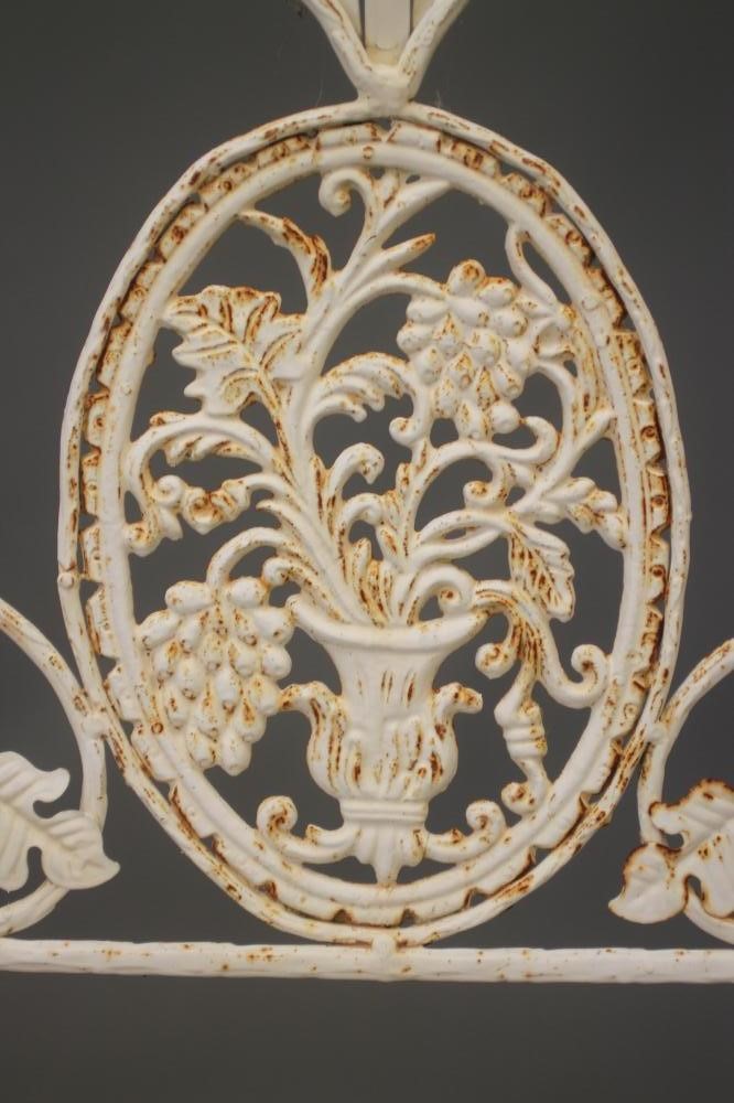 A PAIR OF FOLDING CAST IRON GARDEN ARMCHAIRS Image