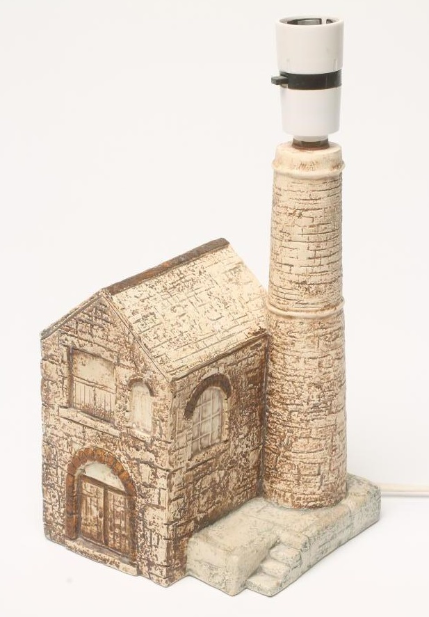 A TROIKA EARTHENWARE TABLE LAMP BASE modelled and decorated as a Cornish Tin Mine Engine House by Image