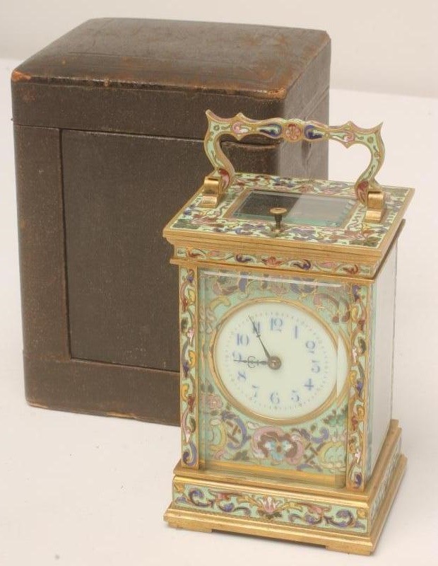A FRENCH BRASS AND CHAMPLEVE ENAMEL CARRIAGE CLOCK Image