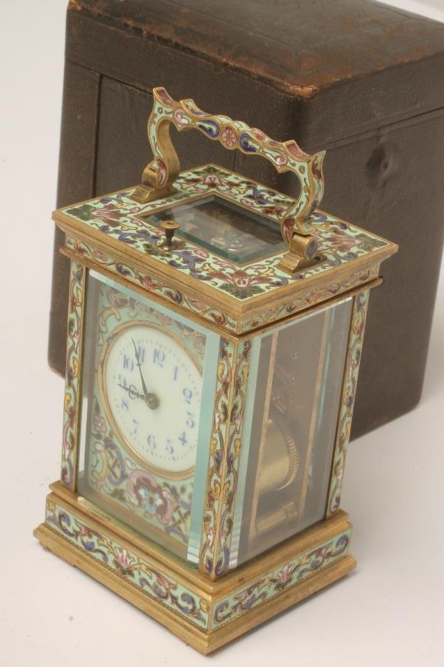 A FRENCH BRASS AND CHAMPLEVE ENAMEL CARRIAGE CLOCK Image