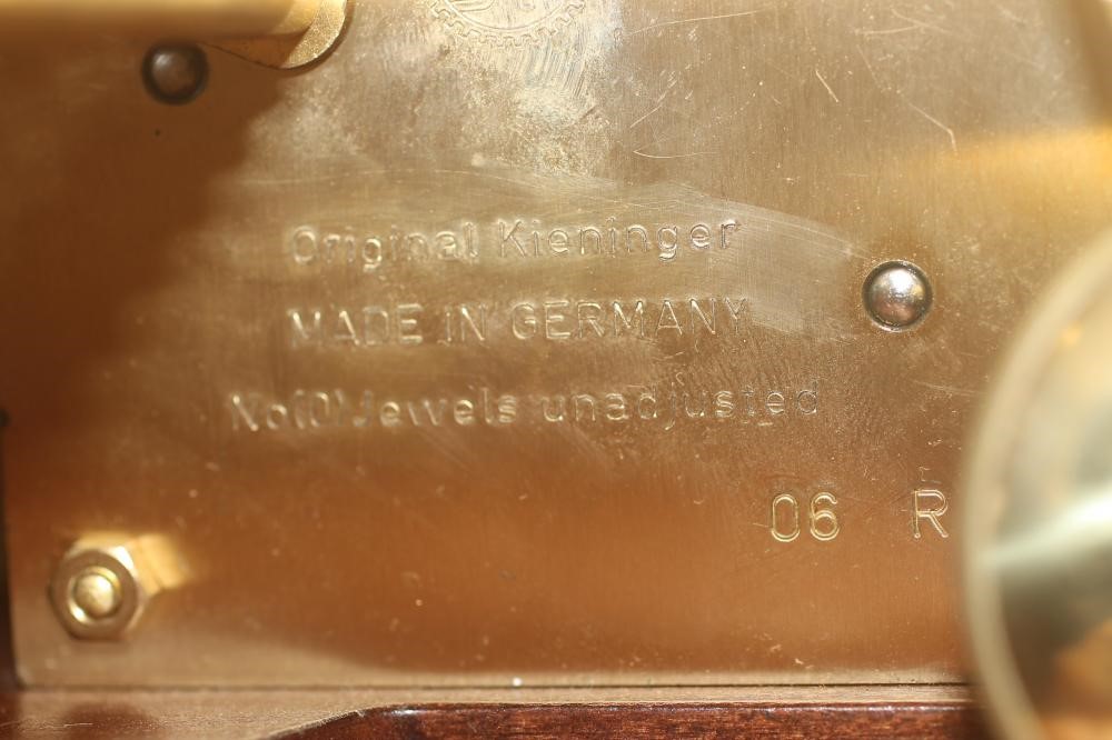 A MAHOGANY CASED TRIPLE CHIME TABLE CLOCK by Kieninger Germany Image