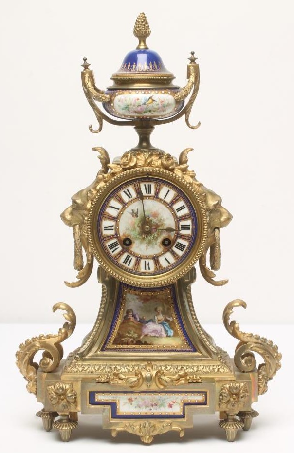 A FRENCH GILT METAL AND PORCELAIN TABLE CLOCK by Japy Freres et Cie Image