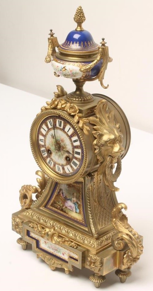 A FRENCH GILT METAL AND PORCELAIN TABLE CLOCK by Japy Freres et Cie Image