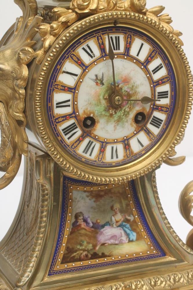 A FRENCH GILT METAL AND PORCELAIN TABLE CLOCK by Japy Freres et Cie Image