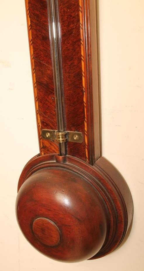 A MAHOGANY FRAMED STICK BAROMETER Image