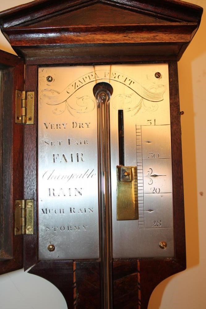 A MAHOGANY FRAMED STICK BAROMETER Image