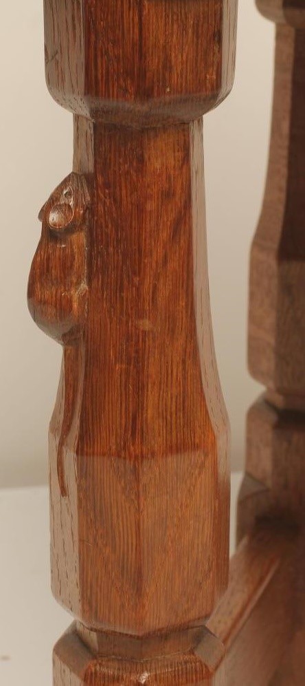 AN ADZED OAK STOOL by Robert Thompson of oblong form with dished seat Image