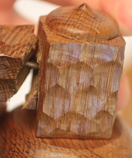 A SET OF SIX ADZED OAK WALL LIGHTS each crescent shaped support issuing a pair of sconces with faux Image