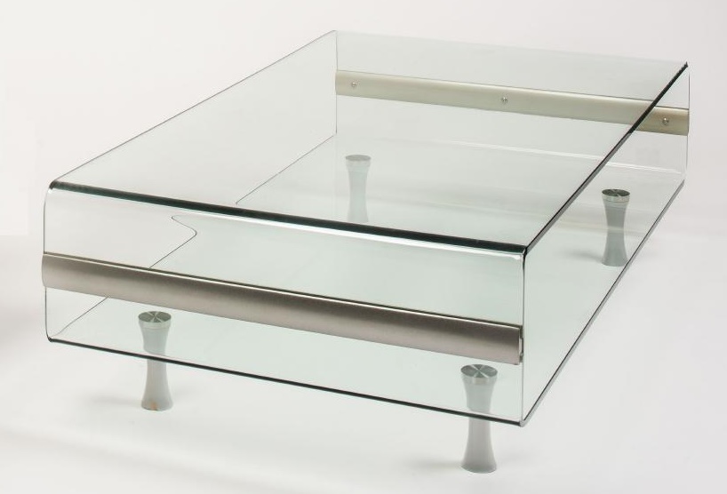 A CLEAR GLASS AND CHROME LOOP COFFEE TABLE Image