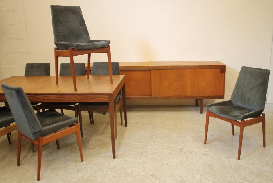 A TEAK DINING SUITE Image