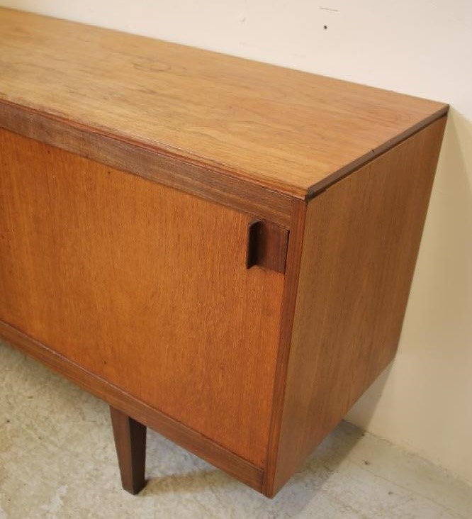 A TEAK DINING SUITE Image