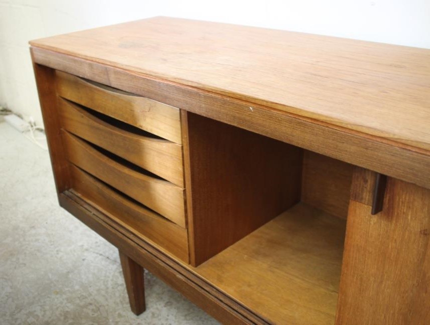 A TEAK DINING SUITE Image