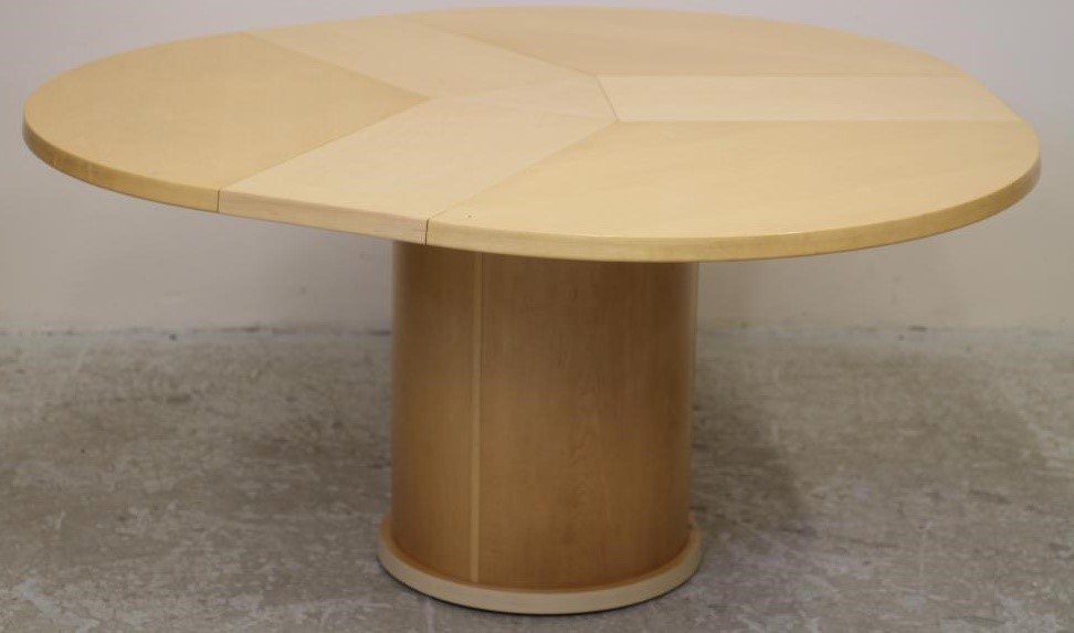 A SKOVBY OF DENMARK EXTENDING MAPLE DINING TABLE Image