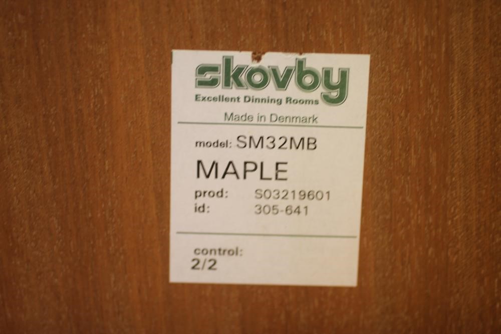 A SKOVBY OF DENMARK EXTENDING MAPLE DINING TABLE Image