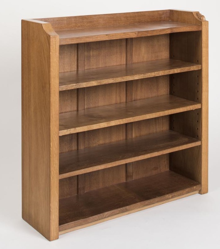AN ADZED OAK OPEN BOOKCASE by Robert Thompson Image