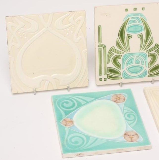 A COLLECTION OF FIVE CONTINENTAL EARTHENWARE TILES Image