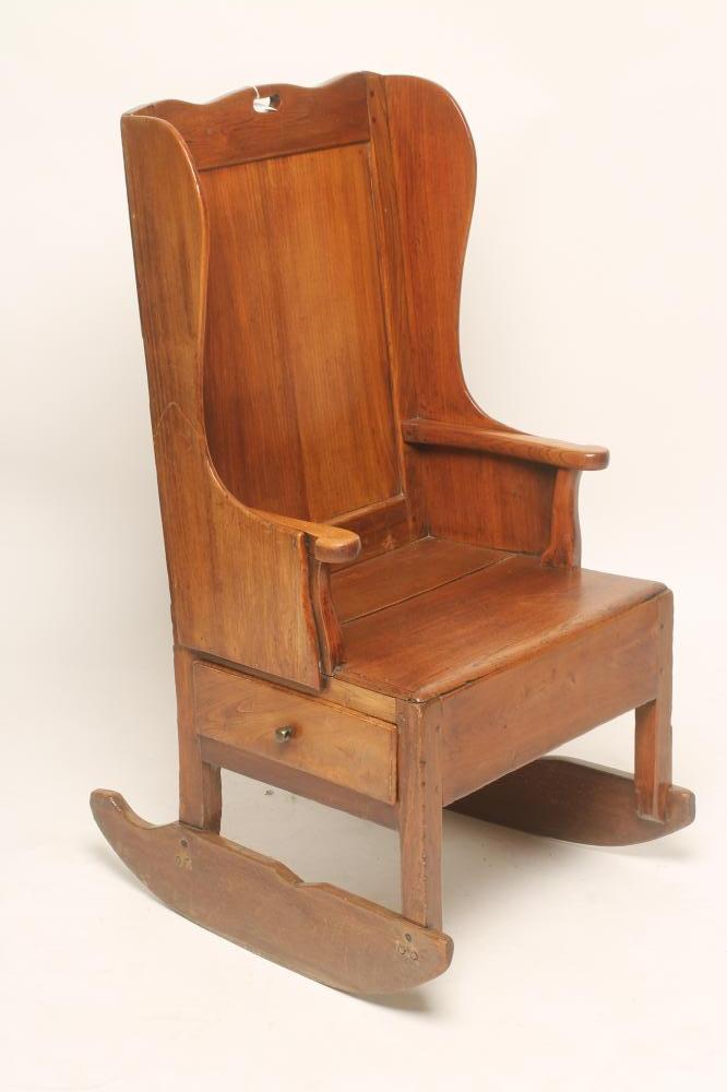 AN ELM WING BACK LAMBING CHAIR Image