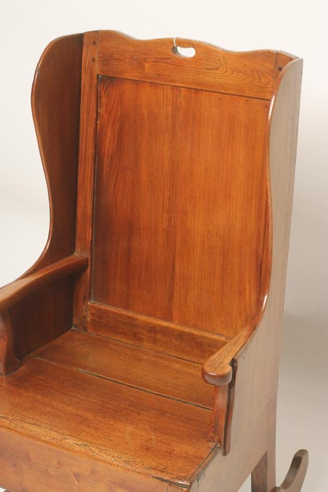 AN ELM WING BACK LAMBING CHAIR Image