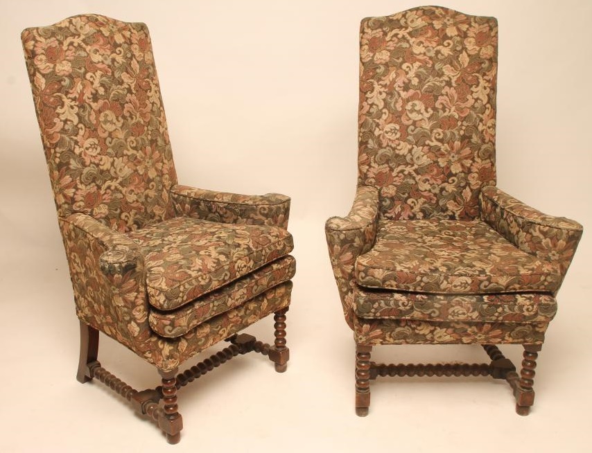 A PAIR OF OAK FRAMED ARMCHAIRS Image